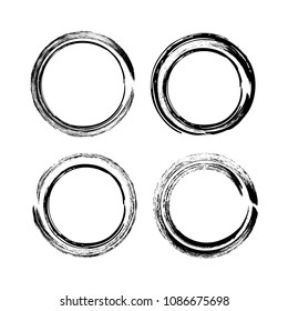 Grunge round frames isolated on white background. Vector design element set.
