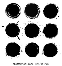 Grunge round shapes.Dirty splash circles.