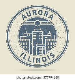 Grunge rubber stamp or label with text Aurora, Illinois written inside, vector illustration svg
