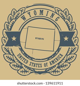 Grunge rubber stamp with name and map of Wyoming, USA, vector illustration