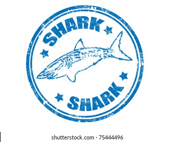Grunge rubber stamp of a shark fish and the word shark written inside