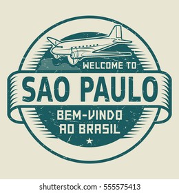 Grunge rubber stamp or tag with airplane and text Welcome to Sao Paulo, Brazil (in Portuguese language too), vector illustration