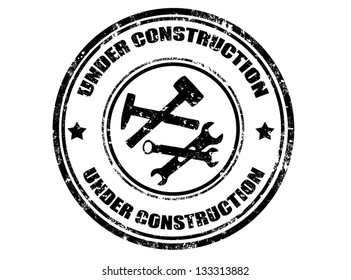 Grunge rubber stamp with text under construction inside,vector illustration