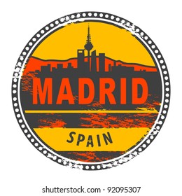 Grunge rubber stamp with the words Madrid, Spain written inside the stamp, vector illustration