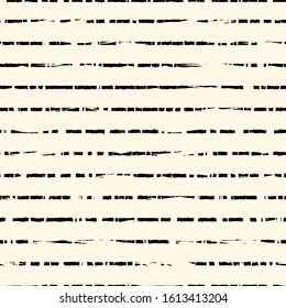 Grunge seamless pattern. Brush freehand stripes surface print. Thin rough edge ink lines motif. Repeated horizontal dash strokes geometric wallpaper. Trendy design. Vector abstract modern background