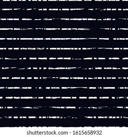 Grunge seamless pattern. Brush freehand stripes surface print. Thin rough edge ink lines motif. Repeated horizontal dash strokes geometric wallpaper. Trendy design. Vector abstract modern background