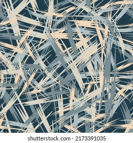 Grunge seamless pattern. Chaotic brush strokes in beige and gray tones on a dark background. Vector.