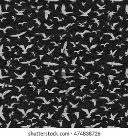 Grunge seamless pattern of flying birds black background. Vector illustration