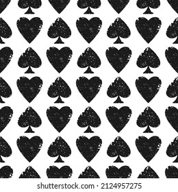 Grunge Seamless pattern with spades and hearts. Scratched Casino gambling, poker background. Alice in wonderland ornament. Fantasy wallpaper.