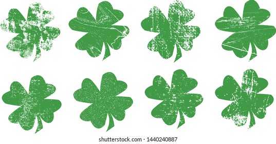 Grunge Shamrock Stamps Collection. Can be used as St. Patrick's Banners, Insignias or Badges. Vector Distressed Textures Set. Blank Shapes. Vector Illustration. Clover isolated on white. EPS10.