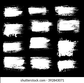 Grunge shapes, set, white isolated on black background, vector illustration.