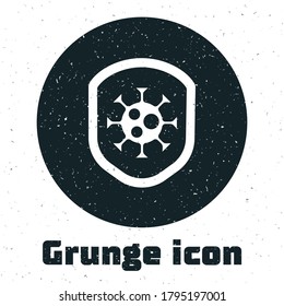 Grunge Shield protecting from virus, germs and bacteria icon isolated on white background. Immune system concept. Corona virus 2019-nCoV. Monochrome vintage drawing. Vector.