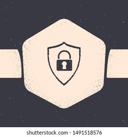 Grunge Shield security with lock icon isolated on grey background. Protection, safety, password security. Firewall access privacy sign. Monochrome vintage drawing. Vector Illustration