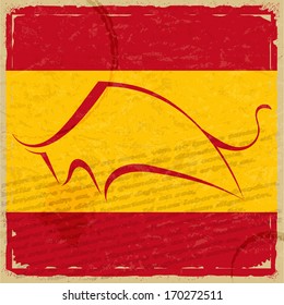 Grunge Spanish flag with the silhouette of a bull