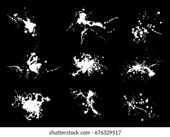 Grunge splatter set. Ink stains design elements. Spray splashes collection. Liquid stains isolated. Grunge stains. Abstract vector illustration.