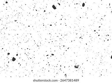 Grunge splatter texture with scattered ink blotches and speckle patterns. High contrast noise effect for abstract vintage surfaces. Artistic dot background.
