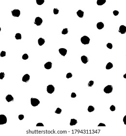 Grunge spots hand drawn vector seamless pattern. Ink dirty circles texture. Black paint dry brush splodges, blotches background. Abstract rough blots, splotches backdrop. Wrapping paper design.