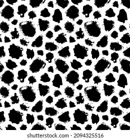Grunge spots hand drawn vector seamless pattern. Ink dirty circles texture. Black paint dry brush splodges, blotches background. Abstract rough blots, splotches backdrop. Wrapping paper design.