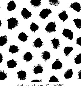 Grunge spots hand drawn vector seamless pattern. Black paint dry brush splodges, blotches background. Black dots, uneven specks and blobs texture. Wallpaper, paper, fabric, textile design.