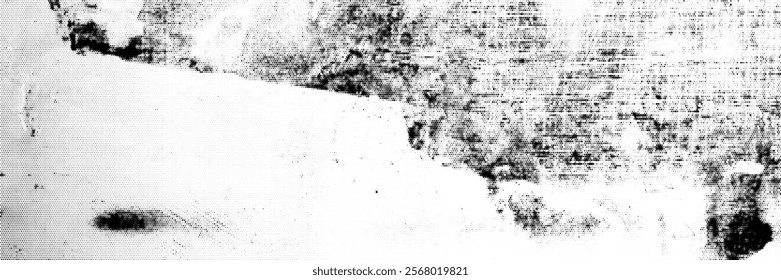 Grunge spotted background with halftone effect. Monochrome print of a scratched, dirty wall.