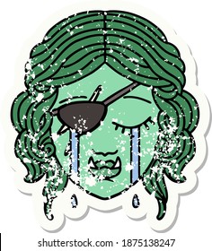 grunge sticker of a crying half orc rogue character face