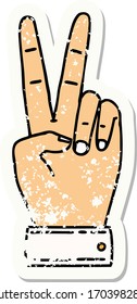 grunge sticker of a peace symbol two finger hand gesture