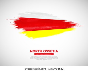 Grunge style brush painted North Ossetia country flag illustration with Independence day typography. Artistic watercolor brush flag vector