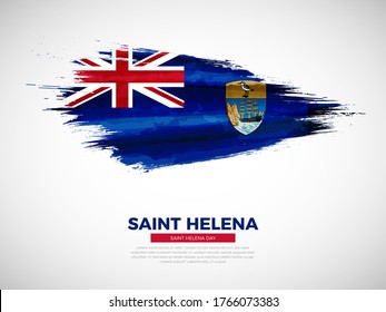 Grunge style brush painted Saint Helena country flag illustration with national day typography. Artistic watercolor brush flag vector