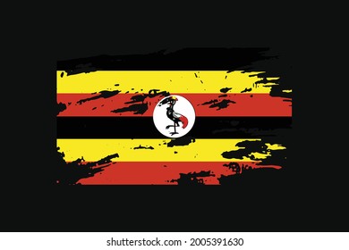 Bandera estilo Grunge de Uganda. Se utilizará para los gráficos de camisetas, la impresión, el afiche y el fondo.