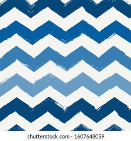 Grunge style seamless pattern. Repeated zigzag motif. Modern minimal geometric surface print. Freehand brush design texture. Handdrawn doodle contemporary ornament. Vector abstract background