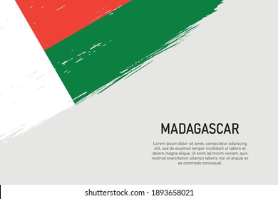 Grunge styled brush stroke background with flag of Madagascar. Template for banner or poster.