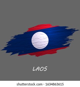 Grunge styled flag of Laos. Brush stroke background