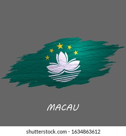 Grunge styled flag of Macau. Brush stroke background