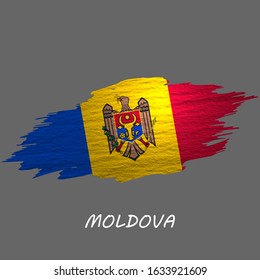 Grunge styled flag of Moldova. Brush stroke background