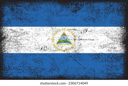Grunge styled flag of Nicaragua. Brush stroke background
