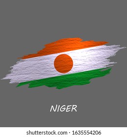 Grunge styled flag of Niger. Brush stroke background