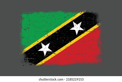 Grunge styled flag of Saint kits and Nevis. Brush stroke background
