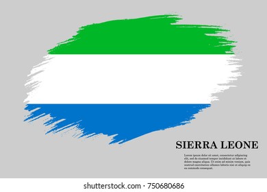 Grunge styled flag of Sierra Leone. Brush stroke background