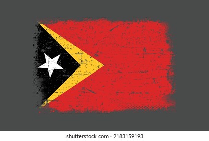Grunge styled flag of Timor-Leste. Brush stroke background

