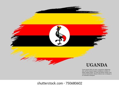 Grunge styled flag of Uganda. Brush stroke background