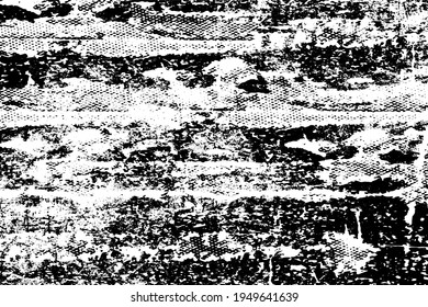 Grunge texture is black and white. The background is made of dirt, chips, scuffs, and wear. Old vintage surface splattered with ink. Soiled backdrop template