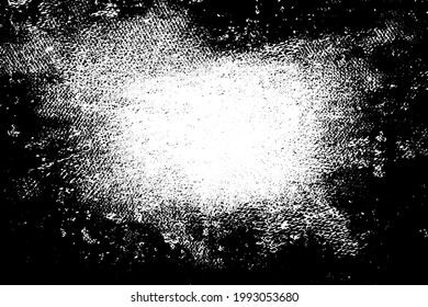 Grunge texture is black and white. The background is made of dirt, chips, scuffs, and wear. Old vintage surface splattered with ink. Soiled backdrop template