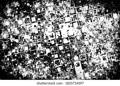 The grunge texture is black and white. Monochrome abstract background. Pattern of scratches, chips, and paint strokes. Black smudges, scuffing, wear and tear