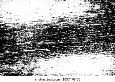 The grunge texture is black and white. Monochrome abstract background. Pattern of scratches, chips, and paint strokes. Black smudges, scuffing, wear and tear