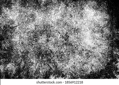 The grunge texture is black and white. Monochrome abstract background. Pattern of scratches, chips, and paint strokes. Black smudges, scuffing, wear and tear