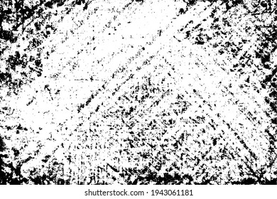 The grunge texture is black and white. Monochrome abstract background. Pattern of scratches, chips, and paint strokes. Black smudges, scuffing, wear and tear
