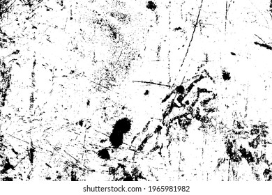The grunge texture is black and white. Monochrome abstract background. Pattern of scratches, chips, and paint strokes. Black smudges, scuffing, wear and tear