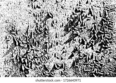 Grunge texture of a cracked surface that resembles a mountain landscape. Monochrome relief rocky background with cracks, spots, noise and grain. Overlay template. Vector illustration