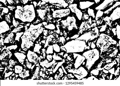 Grunge texture of natural stones of irregular shape. Monochrome rough background of stone placer with noise and grit. Vector illustration