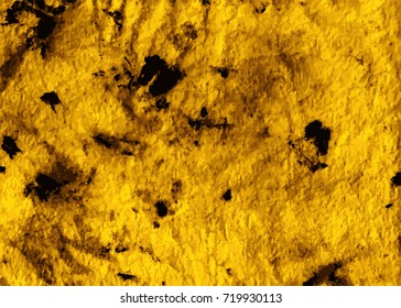 Grunge texture in ocher tones with black spots